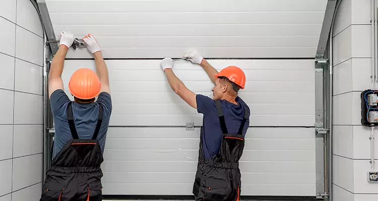 Garage Door Bottom Panel Repair in Vero Beach, FL